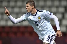 Lyndon Dykes celebrates scoring Scotland's first goal. Picture: Radek Petrasek/PA Wire
