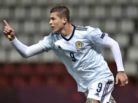 Lyndon Dykes celebrates scoring Scotland's first goal. Picture: Radek Petrasek/PA Wire