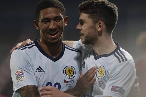Ryan Christie, right, celebrates with Liam Palmer, left, after Scotland's 2-1 win over Czech Republic