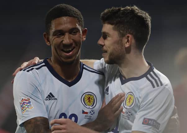 Ryan Christie, right, celebrates with Liam Palmer, left, after Scotland's 2-1 win over Czech Republic