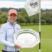 Heather MacRae with the trophy after her victory in the WPGA Championship.