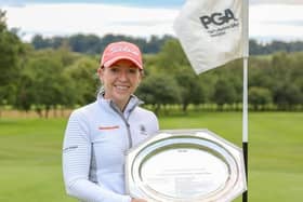 Heather MacRae with the trophy after her victory in the WPGA Championship.