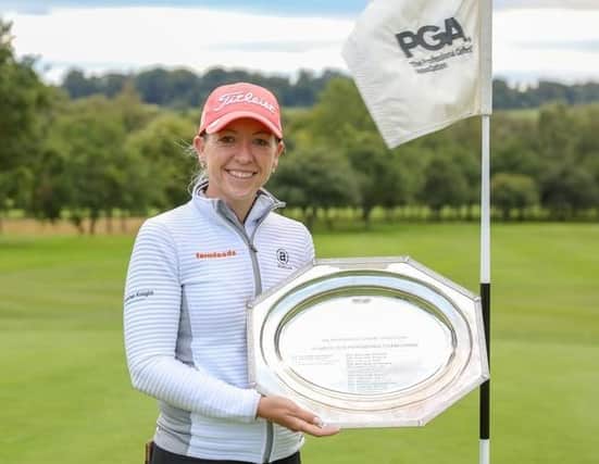 Heather MacRae with the trophy after her victory in the WPGA Championship.