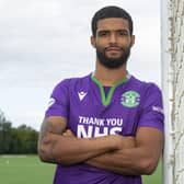 New signing Dillon Barnes is unveiled at the Hibernian Training Centre. Picture: SNS