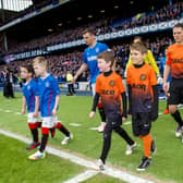 The teams emerge from the Ibrox tunnel the last  time Rangers and Dundee United played, in 2014.  Picture: Sammy Turner/SNS