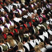 Graduates from Edinburgh University celebrate after a ceremony at the McEwan Hall in the centre of Edinburgh