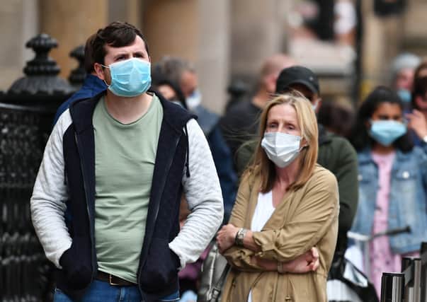 Shoppers wearing face masks  in Glasgow. Picture: John Devlin