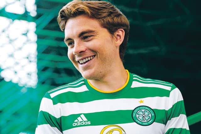 James Forrest models the new Celtic kit.