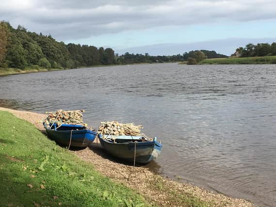 Fishing cobles near the Border on the meandering River Tweed. There's definitely a Border but a river runs through it.