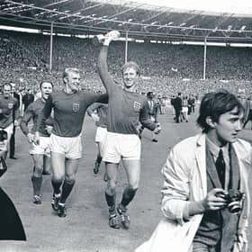 England defender Jack Charlton holds aloft the World Cup trophy at Wembley in 1966. Picture: PA Wire.