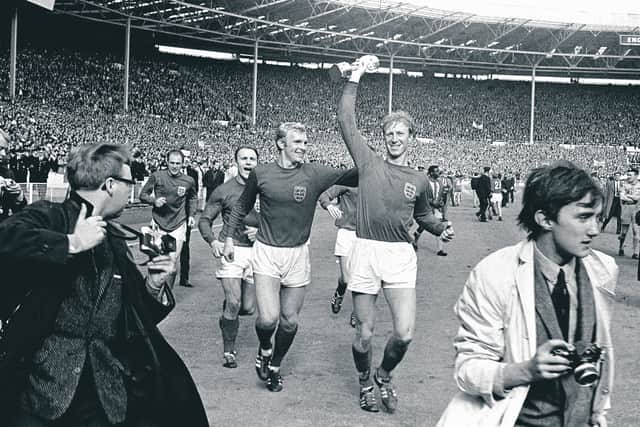 England defender Jack Charlton holds aloft the World Cup trophy at Wembley in 1966. Picture: PA Wire.