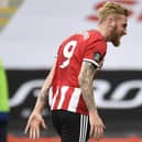 Sheffield United's Oli McBurnie celebrates after scoring his side's second goal in the 3-0 win over Chelsea. Picture: Peter Powell/AP