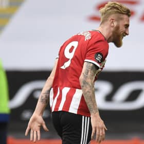 Sheffield United's Oli McBurnie celebrates after scoring his side's second goal in the 3-0 win over Chelsea. Picture: Peter Powell/AP
