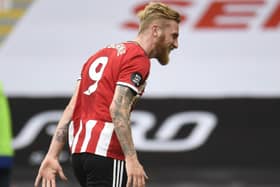 Sheffield United's Oli McBurnie celebrates after scoring his side's second goal in the 3-0 win over Chelsea. Picture: Peter Powell/AP