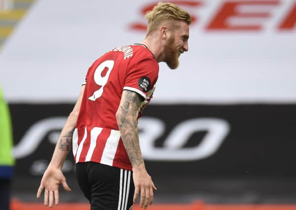 Sheffield United's Oli McBurnie celebrates after scoring his side's second goal in the 3-0 win over Chelsea. Picture: Peter Powell/AP