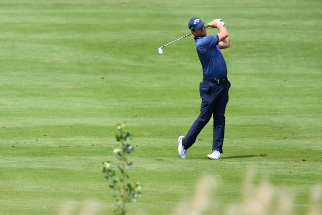 Marc Warren plays a shot on the fifth hole en route to winning the Austrian Open, a result which means that the Scot can skip this week’s Euram Bank Open. Picture: Stuart Franklin/Getty Images