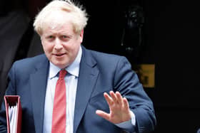 Boris Johnson and his Home Secretary Priti Patel need to rethink their attitude to immigration by care sector workers (Picture: Tolga Akmen/AFP via Getty Images)
