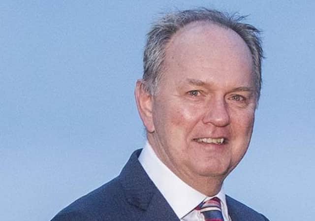 St Andrews Links Trust chief exectuvie Euan Loudon, left, with Martin Slumbers of the R&A.