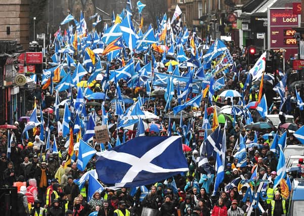 Independence supporters march through Glasgow in January.