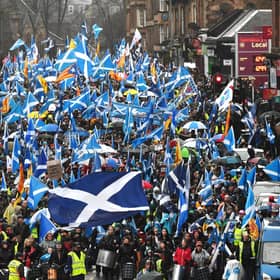 Independence supporters march through Glasgow