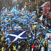 Independence supporters march through Glasgow