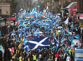 Independence supporters march through Glasgow