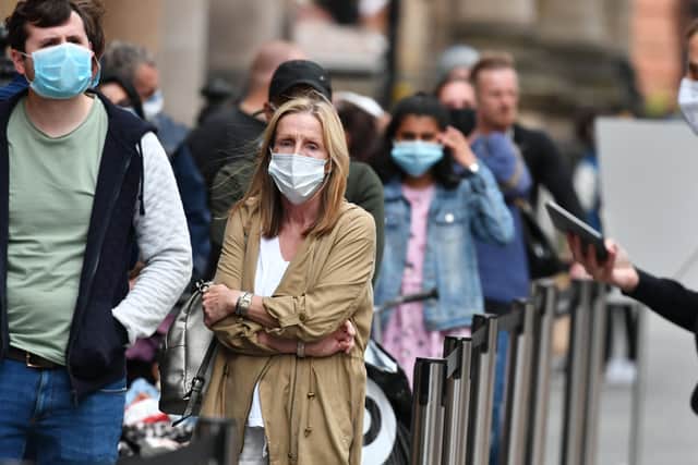 Shoppers wearing face masks in Glasgow.
 Picture: John Devlin
