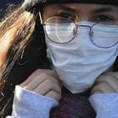 Home-made face masks should have two layers, international research has found. Picture: Daniel Leal-Olivas/AFP via Getty Images