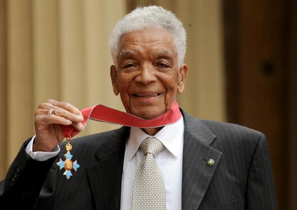 Earl Cameron at Buckingham Palace with his CBE in 2009.  (Photo by Anthony Devlin/WPA Pool/Getty Images)