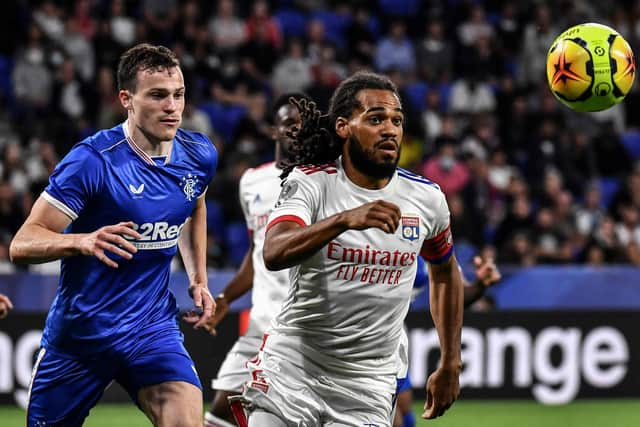 Rangers defender George Edmundson and Lyon's former Celtic defender Jason Denayer vie for the ball. Picture: AFP via Getty Images