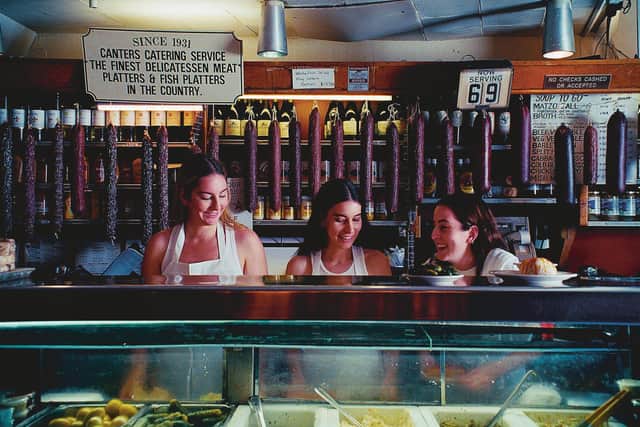 At Canter's deli in LA, where they first played together live without their parents in 1999. The sisters were on a Deli Tour when it was cancelled due to covid-19, but returned to the iconic eatery to livestream a lockdown gig.