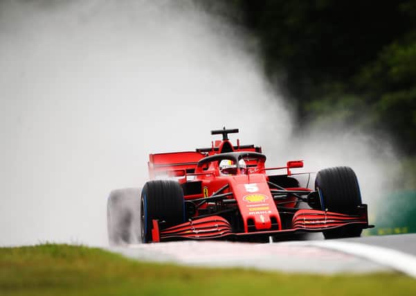 German Sebastian Vettel was fastest in a wet second Budapest GP practice session in his Ferrari. Picture: Bryn Lennon/Getty