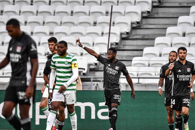Moussa Dembele, centre, celebrates opening the scoring in Lyon’s 2-1 victory over Celtic. Picture: AFP/Getty