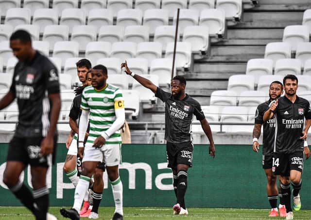 Moussa Dembele, centre, celebrates opening the scoring in Lyon’s 2-1 victory over Celtic. Picture: AFP/Getty