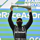 Mercedes driver Lewis Hamilton celebrates after winning the Hungarian Grand Prix at the Hungaroring racetrack. Picture: Joe Klamar/Pool via AP