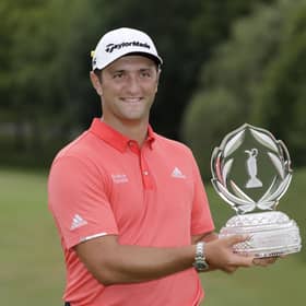 Jon Rahm holds the Memorial Tournament trophy following his victory at Muirfield Village. Picture: AP.