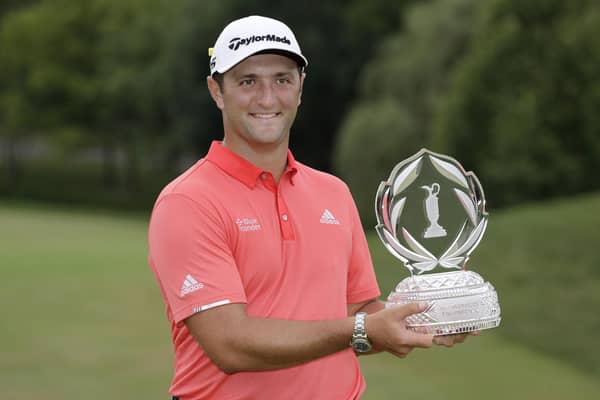 Jon Rahm holds the Memorial Tournament trophy following his victory at Muirfield Village. Picture: AP.