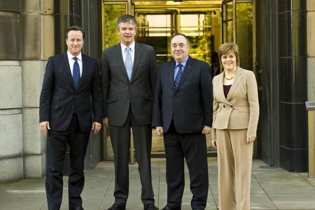 Former Scottish First Minister Alex Salmond at St Andrew's House in Edinburgh, with ex-Prime Minister David Cameron ahead of signing a deal on holding the 2014 Scottish independence referendum. They are pictured with Nicola Sturgeon and Michael Moore