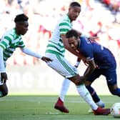 Paris Saint-Germain's Neymar tries to find a way past Celtic defenders Jeremie Frimpong and Christopher Jullien. Picture: Franck Fife/AFP via Getty Images