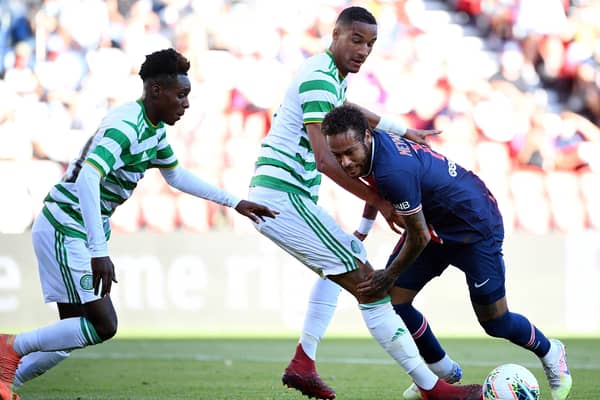 Paris Saint-Germain's Neymar tries to find a way past Celtic defenders Jeremie Frimpong and Christopher Jullien. Picture: Franck Fife/AFP via Getty Images