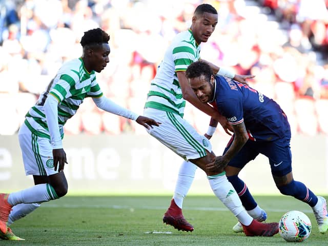 Paris Saint-Germain's Neymar tries to find a way past Celtic defenders Jeremie Frimpong and Christopher Jullien. Picture: Franck Fife/AFP via Getty Images