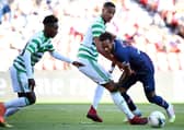 Paris Saint-Germain's Neymar tries to find a way past Celtic defenders Jeremie Frimpong and Christopher Jullien. Picture: Franck Fife/AFP via Getty Images