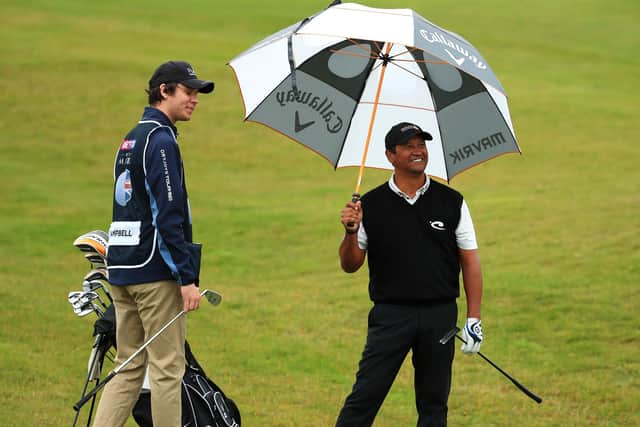 Michael Campbell looks on before he plays his shot on the 8th hole with son and caddie, Thomas, during the first round of the Betfred British Masters. Picture: Andrew Redington/Getty Images