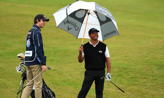 Michael Campbell looks on before he plays his shot on the 8th hole with son and caddie, Thomas, during the first round of the Betfred British Masters. Picture: Andrew Redington/Getty Images