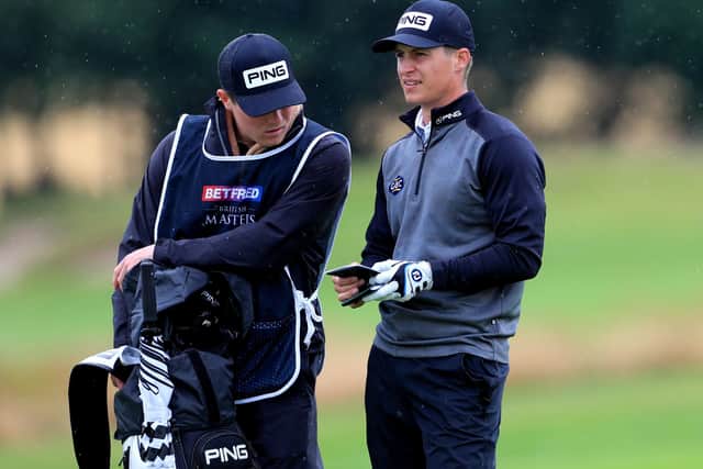 Calum Hill during the second round of the British Masters, where his younger brother Ian is caddying for him. Picture: Mike Egerton/PA Wire