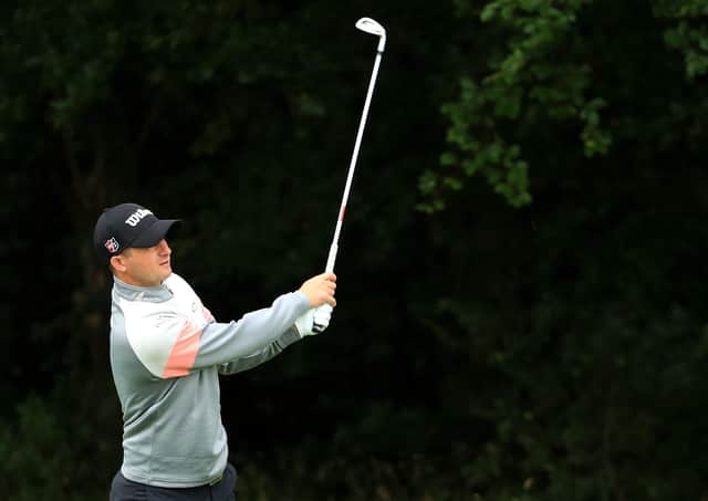 David Law plays his second shot on the 1st in the second round of the Betfred British Masters. Picture: Andrew Redington/Getty