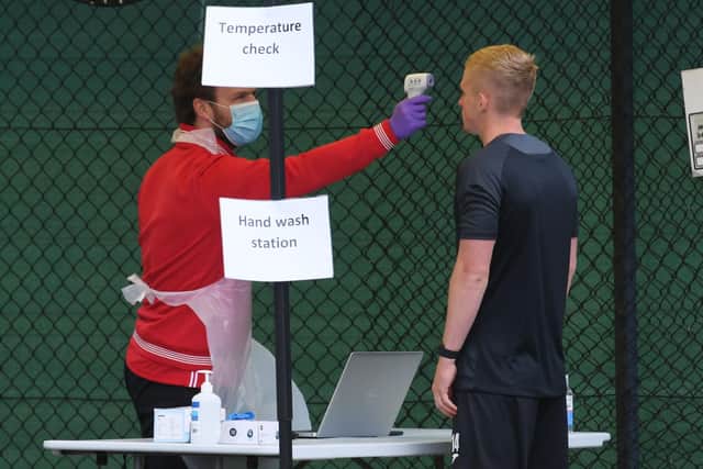 St Mirren's Cammy MacPherson has his temperature checked when his side returned to training. Picture: SNS Group