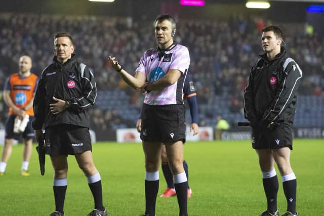 Referee Marius Mitrea and his assistants consult the TMO during Edinburgh’s match against Connacht at BT Murrayfield in February. Picture: SNS/SRU.