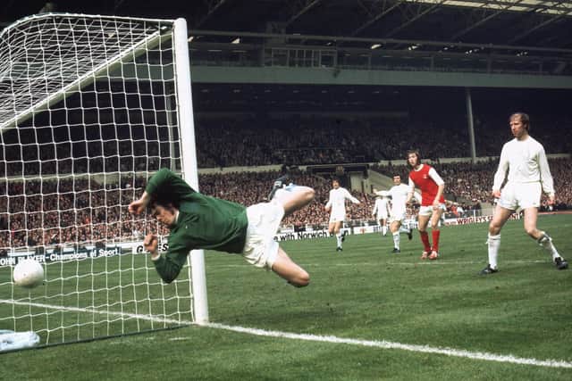 With his late friend and team-mate Jack Charlton looking on, Harvey has a shot covered in Leeds United’s 1972 FA Cup win over Arsenal. Picture: A Jones/Express/Getty Images