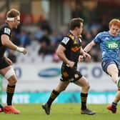 Finlay Christie of the Blues puts in a kick during the Super Rugby Aotearoa match against the Chiefs at Eden Park. Picture: Anthony Au-Yeung/Getty Images